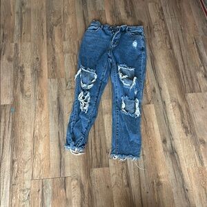 Distressed Blue Denim Jeans